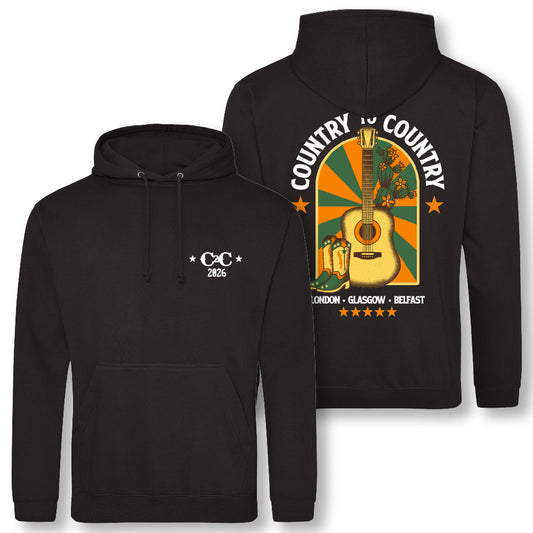 PRE-ORDER the 2026 Online Exclusive Hoodie from C2C Country To Country Store. It features "C2C 2026" with stars on the front and a vivid back print of a guitar, cowboy boots, wheat, sunburst rays, and “Country to Country” city names.