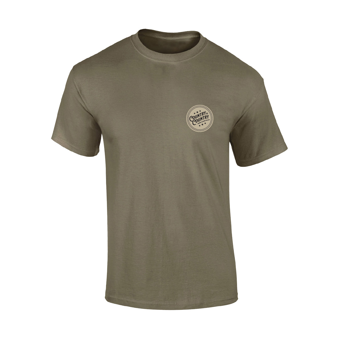 The 2025 Prairie Dust Glasgow T-Shirt by C2C Country To Country Store is an olive green, short-sleeve crewneck with a small round logo on the left chest—classic and perfect for daily wear.