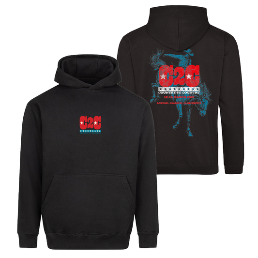 Front and back view of a black PRE-ORDER: 2027 Online Exclusive Hoodie featuring a red and blue C2C logo, with the back design including a silhouette of a cowboy on a bucking horse and text detailing 2027 festival dates and locations.